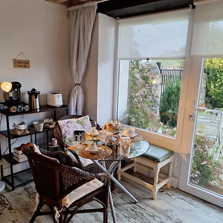 Проживание в семье La Buganvilla En Udias Комильяс